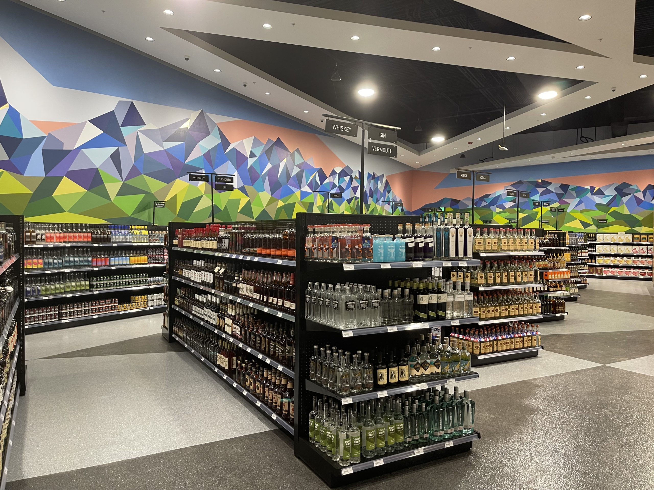 image showing liquor bottles on shelves inside store 52